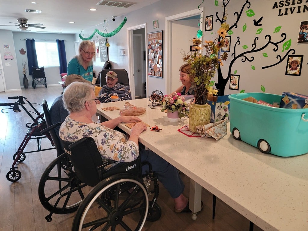 group of people sitting around a table