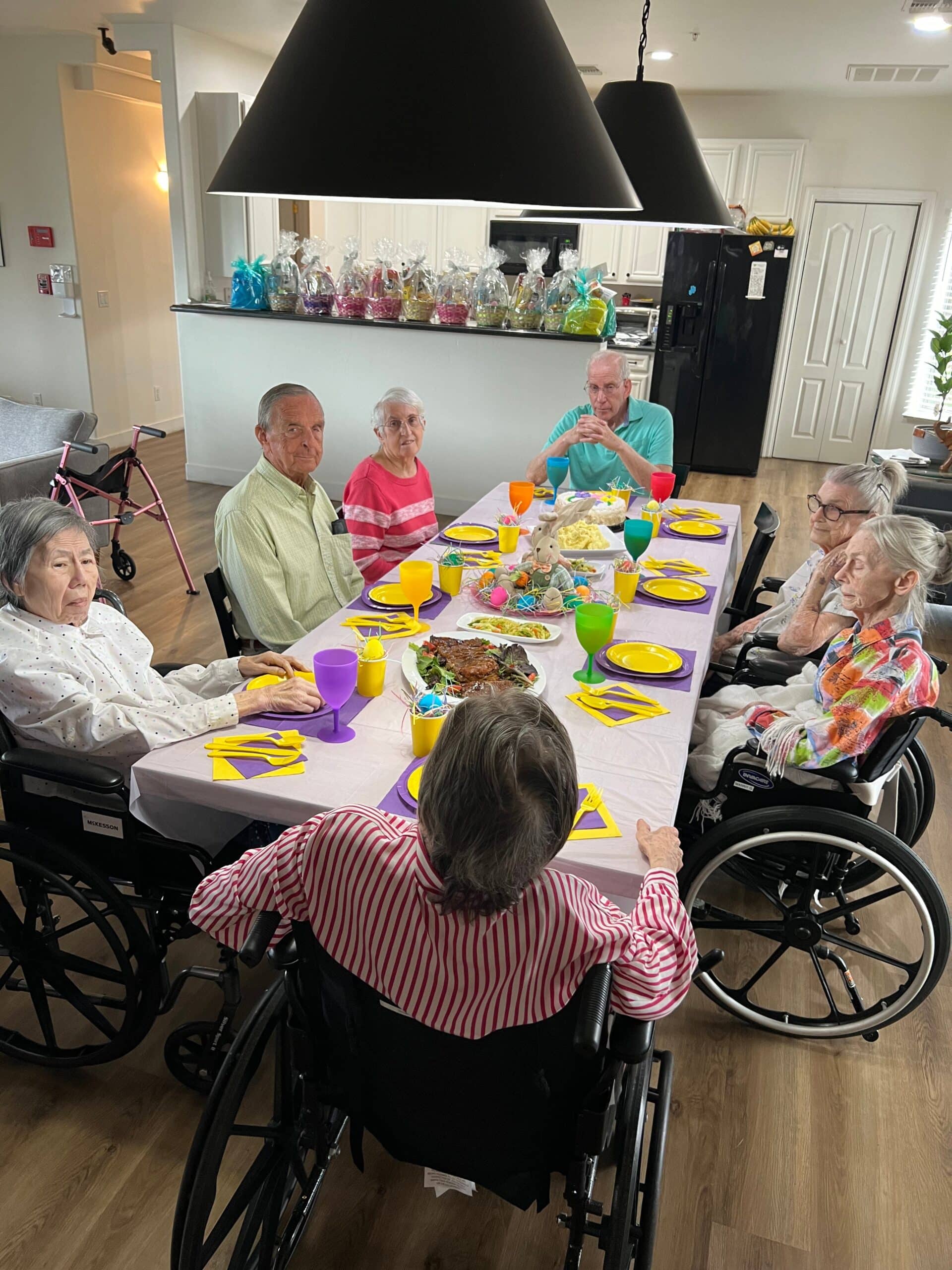 group of people sitting around a table